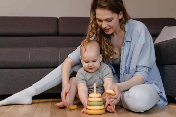sitting child with adult